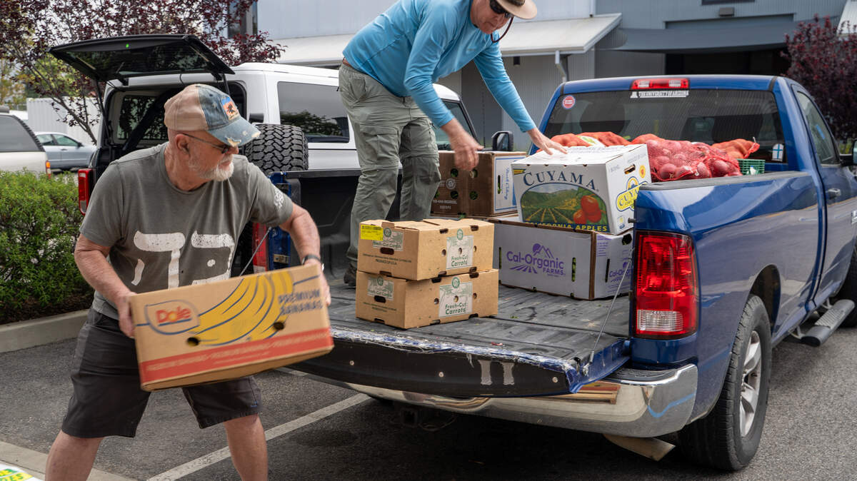 Volunteers Michael Gotschall and Byron Jones prepare to transport SLO Food Bank donations to Nipomo Community Presbyterian Church on Friday, May 1, 2026. The SLO Food Bank is one of many food insecurity organizations that are facing CalFood funding cuts in this year's state budget. Delay of the California Food Assistance Program worsens hunger. State leaders must act now to fund food benefits for immigrants and shore up the safety net. Volunteers Michael Gotschall and Byron Jones prepare to transport SLO Food Bank donations to Nipomo Community Presbyterian Church on Friday, May 1, 2026. The SLO Food Bank is one of many food insecurity organizations that are facing CalFood funding cuts in this year's state budget. Delay of the California Food Assistance Program worsens hunger. State leaders must act now to fund food benefits for immigrants and shore up the safety net.